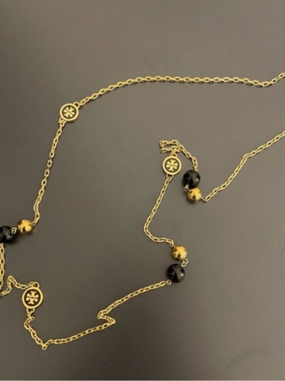Tory Burch Gold Tone Long Station Necklace Black Blue Double T Logo Medallion